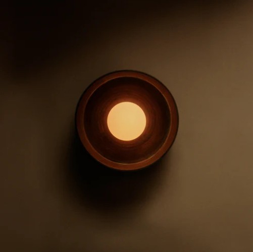 InCommonWith_Szilvassy_Ceramic_Disc_Surface_Mount_FrontView_On_Red_Tenmoku